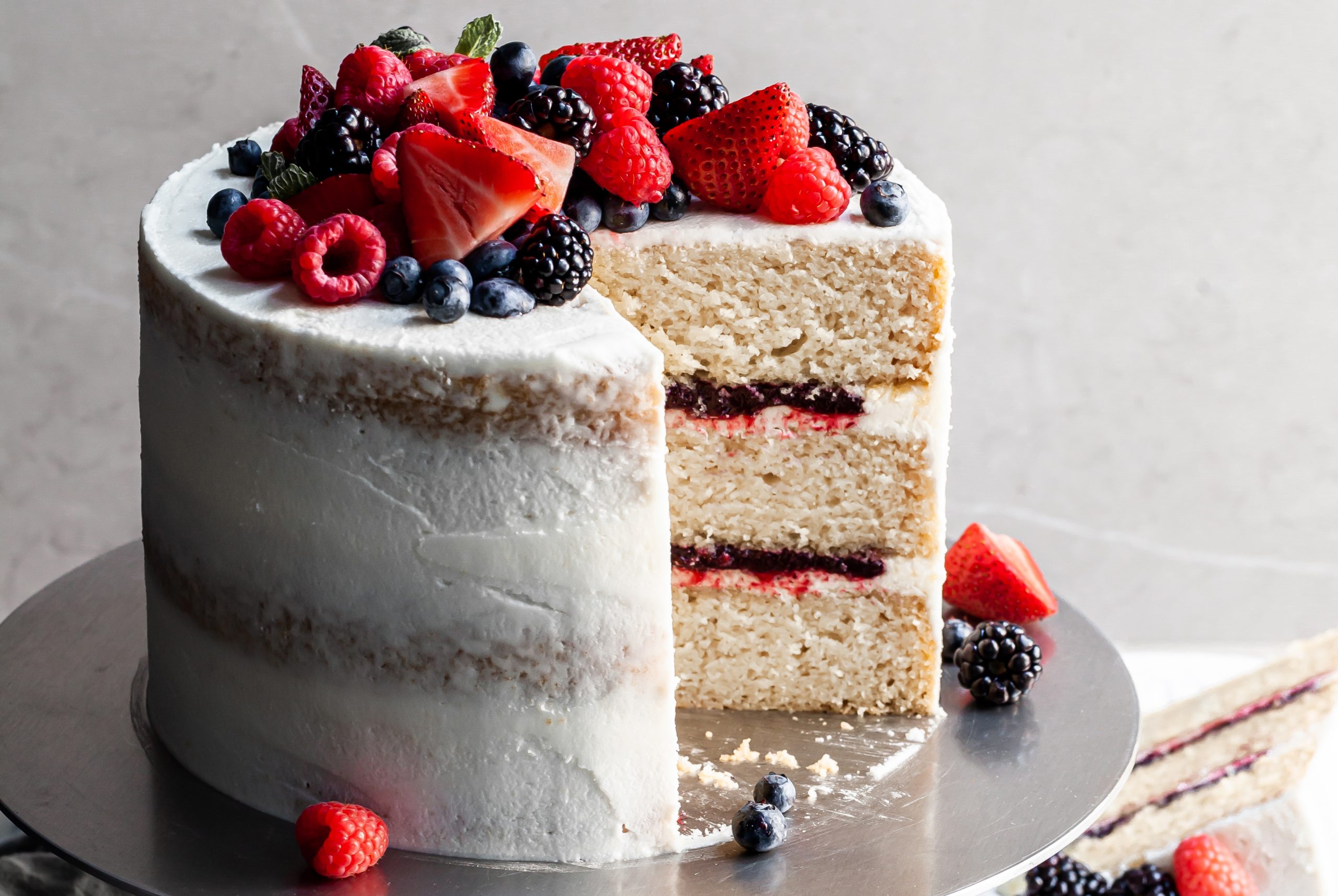 Cut Berry Vanilla Cake with Slice by Bronwyn Fraser-landscape