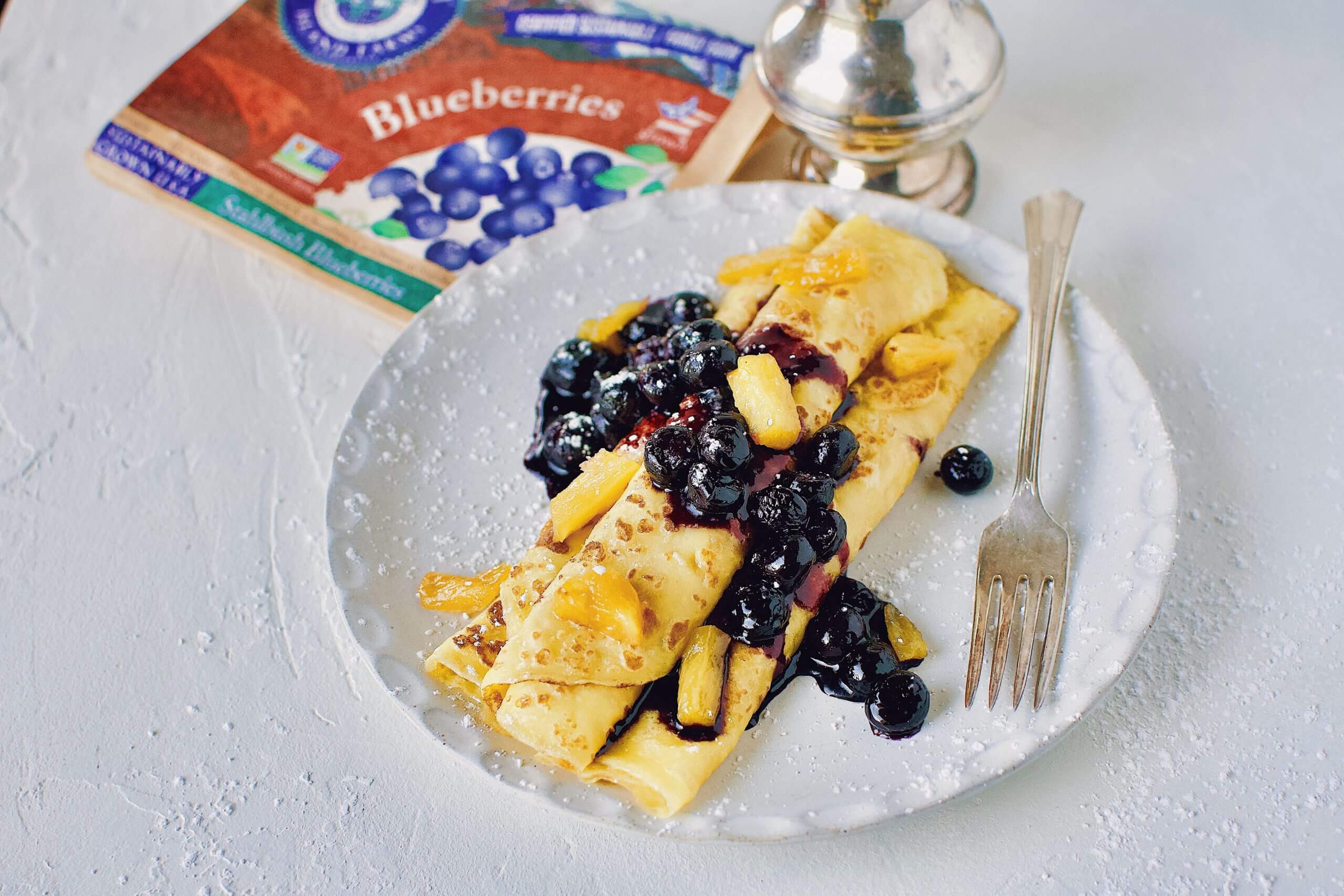 Crepes with Caramelized Pineapple and Blueberries Stahlbush Island Farms Frozen Blueberries