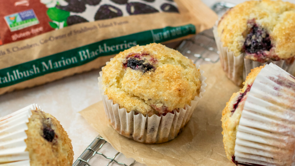 close up of marionberry muffins made with Stahlbush Island Farms Marion Blackberries