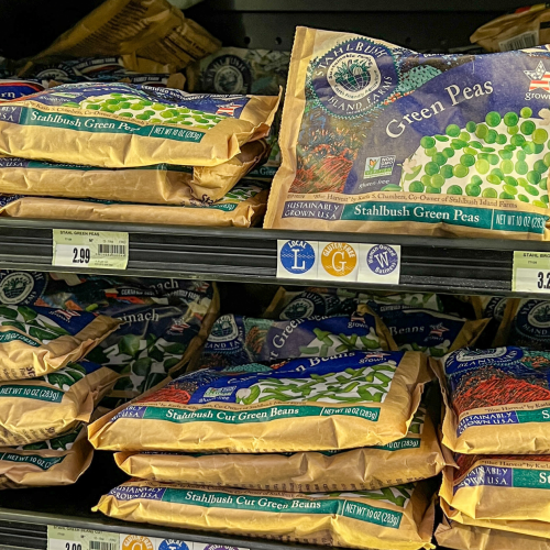 a display of bags of frozen vegetables in the freezer section at the grocery store of Stahlbush Island Farms' products